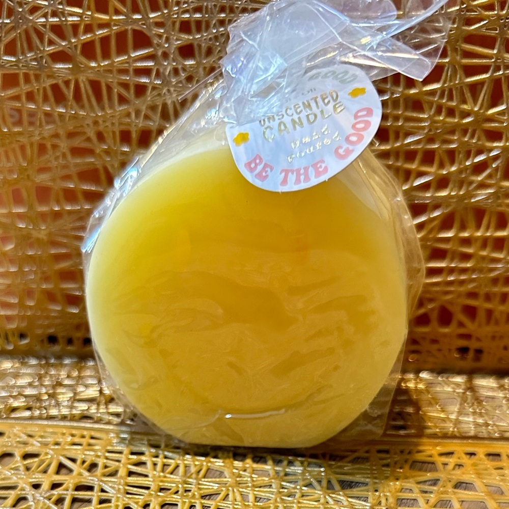 Unscented yellow smiley face Candle